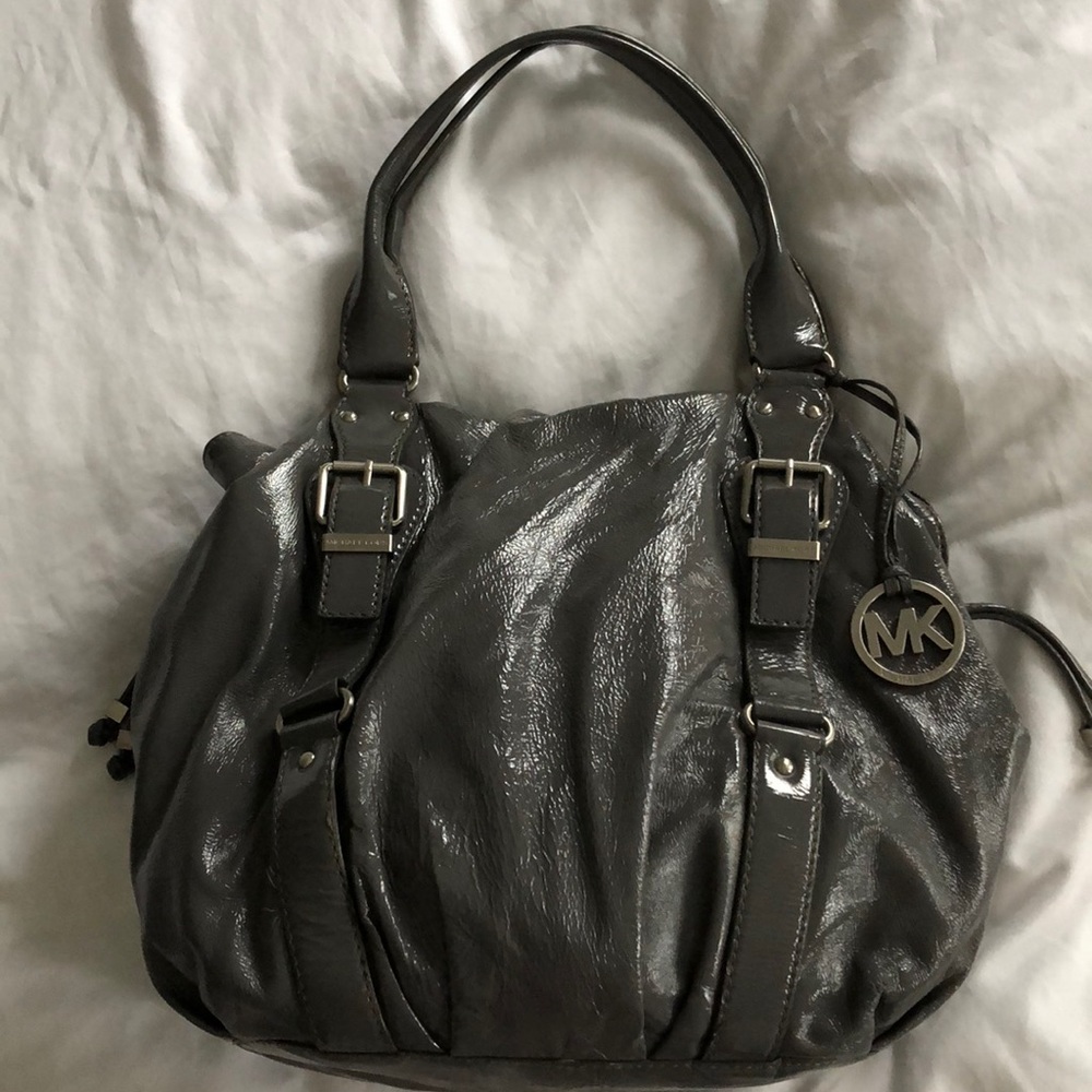 MK grey patent leather slouch drawstring bag